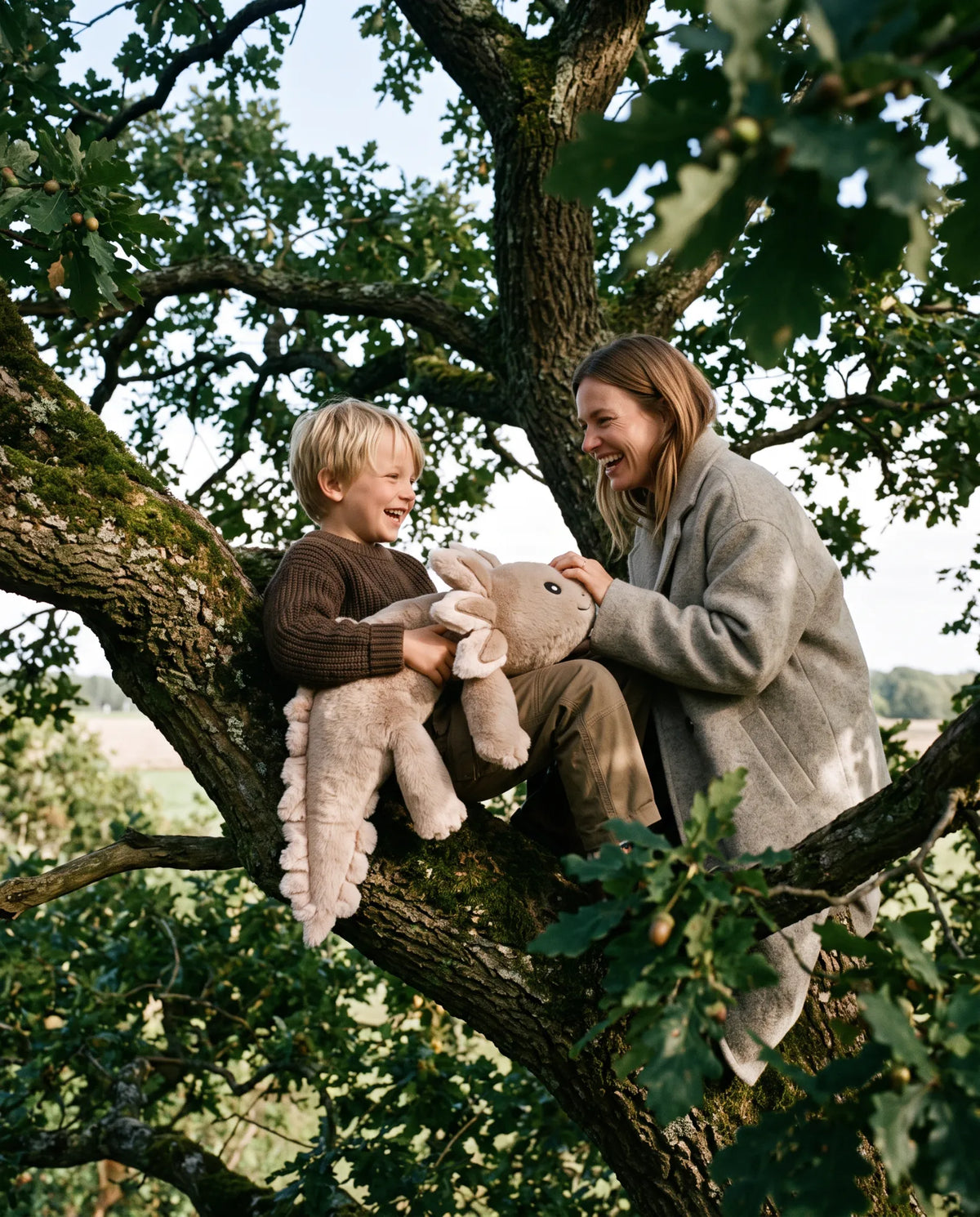 Mother and child laughing in a tree with the weighted Axolotl in Mushroom #Colour_Mushroom
