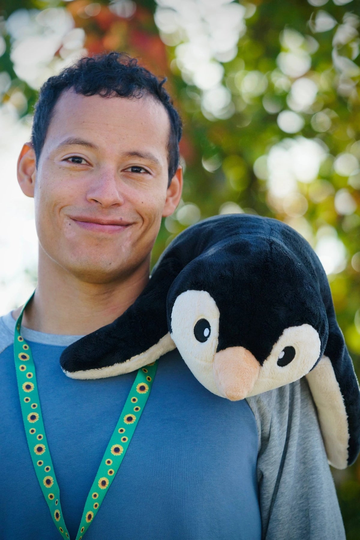 Martin Moxness with the weighted penguin on his shoulder