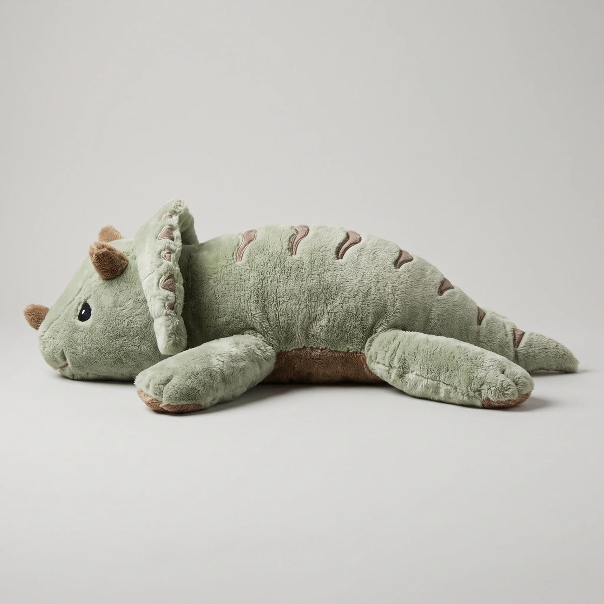 Weighted Dinosaur in Matcha, 2.3 kg, seen from the side #Colour_Matcha