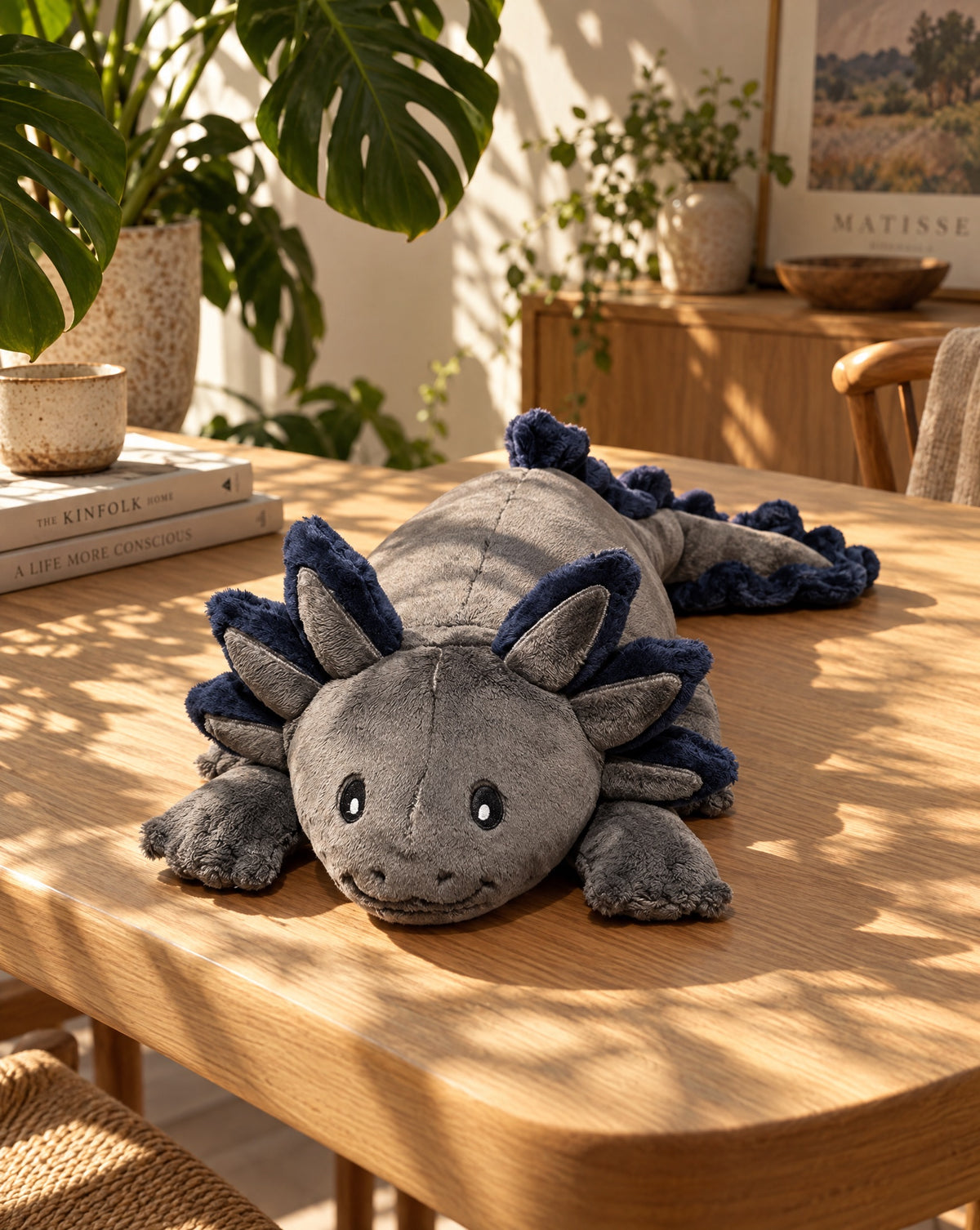 Weighted Axolotl in Blue Flame, 2.3 kg, resting on a wooden table
